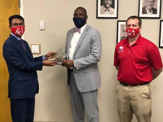 eft to Right: Dr. John Cleary, USA Faculty Senate President; Chresal Threadgill, Mobile County Public School System (MCPSS) Superintendent; Dr. Delwar Hossain, USA Department of Communication.